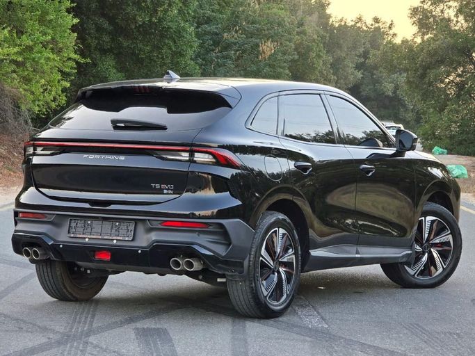 Подержанный DongFeng Forthing T5 I Рестайлинг 2, 1.5 л, 2024 в Шардже от Al Jana Used Cars Черный цвет. GCC | AUTO.AE