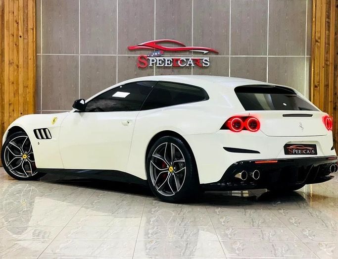 Used Ferrari GTC4Lusso T, 3.9 l, 2018 in Sharjah by Speed Cars, White color. GCC Specs | AUTO.AE