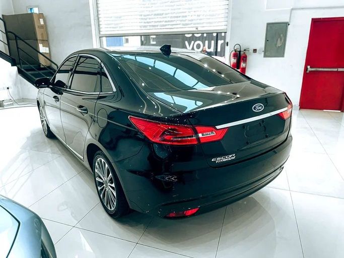 Подержанный Ford Escort VI Рестайлинг 1, 1.5 л, 2020 в Шардже от Ryno Cars Черный цвет. GCC | AUTO.AE