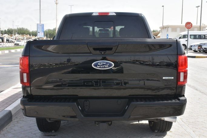 Подержанный Ford F-150 XIV, 3.5 л, 2020 в Шардже от Alfaris Used Cars Черный цвет.  | AUTO.AE