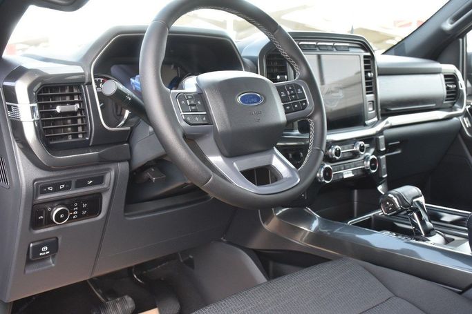 Подержанный Ford F-150 XIV, 3.5 л, 2023 в Шардже от Alfaris Used Cars Серый цвет.  | AUTO.AE