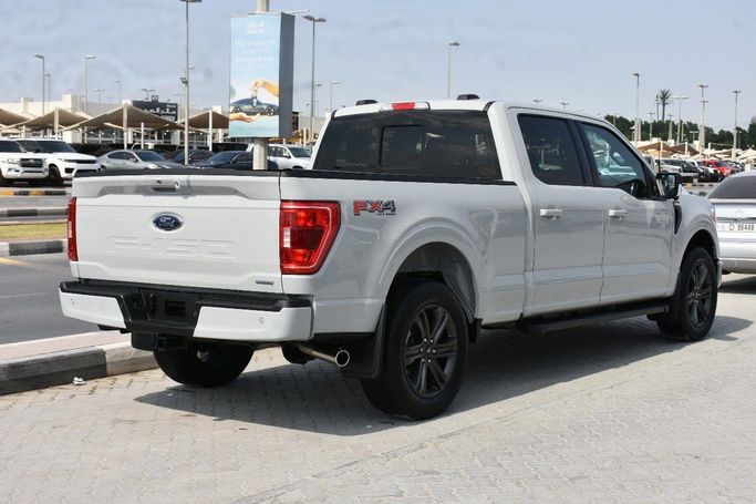 Подержанный Ford F-150 XIV, 3.5 л, 2023 в Шардже от Alfaris Used Cars Серый цвет.  | AUTO.AE