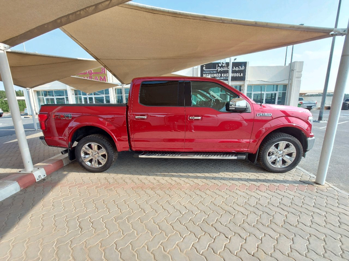 Used Ford F-150 XIII Facelift, 3.5 l, 2019 in Sharjah by MK Cars, Red color. American Specs | AUTO.AE