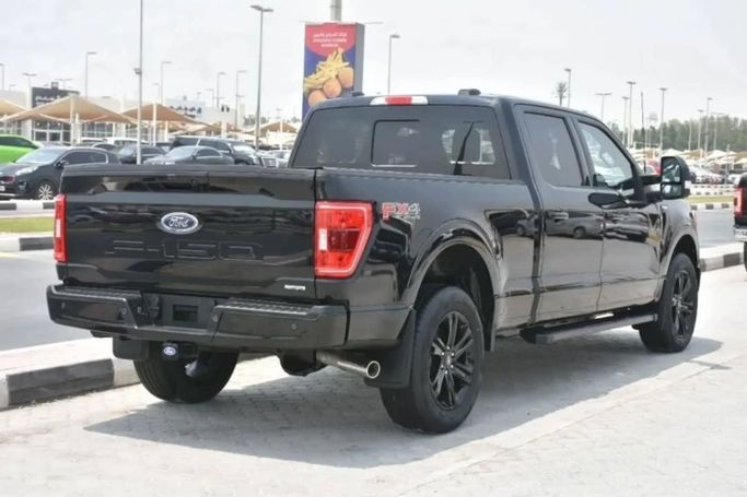 Used Ford F-150 XIV, 3.5 l, 2023 in Sharjah by Alfaris Used Cars, Black color. Other | AUTO.AE