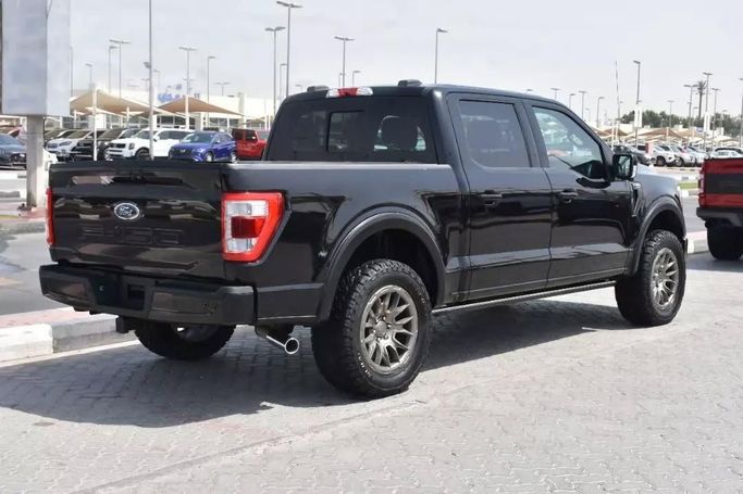 Подержанный Ford F-150 XIV, 5.0 л, 2021 в Шардже от Alfaris Used Cars Черный цвет. Other | AUTO.AE