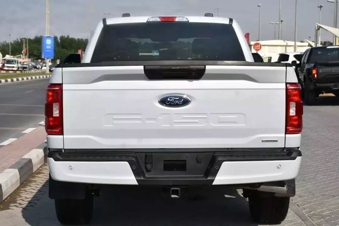 Used Ford F-150 XIV, 3.5 l, 2021 in Sharjah by Alfaris Used Cars, White color. Other | AUTO.AE