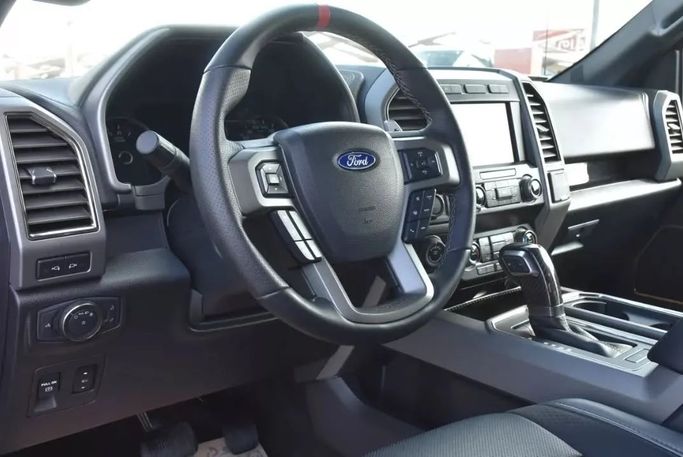 Used Ford F-150 XIV, 5.0 l, 2020 in Sharjah by Alfaris Used Cars, Red color. Other | AUTO.AE