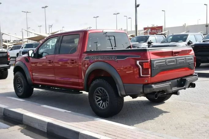 Used Ford F-150 XIV, 5.0 l, 2020 in Sharjah by Alfaris Used Cars, Red color. Other | AUTO.AE