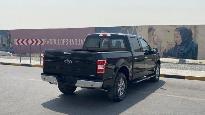 Подержанный Ford F-150 XIII Рестайлинг, 2.7 л, 2019 в Шардже от Halla Cars Черный цвет. Американская | AUTO.AE