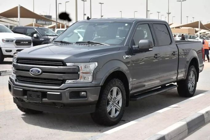 Подержанный Ford F-150 XIII Рестайлинг, 3.5 л, 2019 в Шардже от Alfaris Used Cars Серый цвет. Other | AUTO.AE