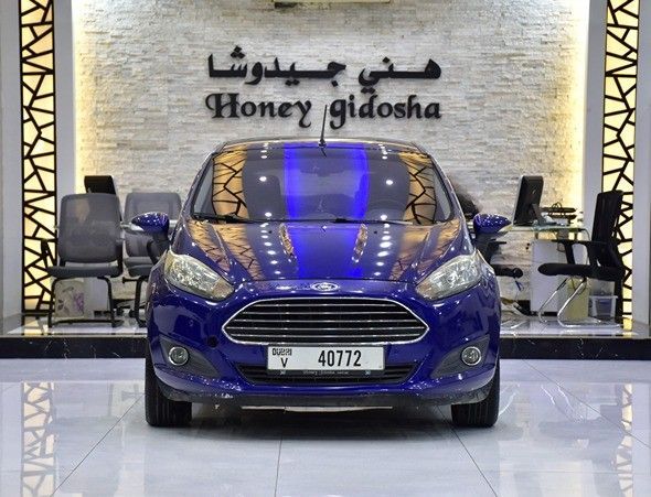 Подержанный Ford Fiesta Mk6 Рестайлинг, 1.6 л, 2015 в Шардже от Honey Gidosha Used Cars Tr. Синий цвет.  | AUTO.AE