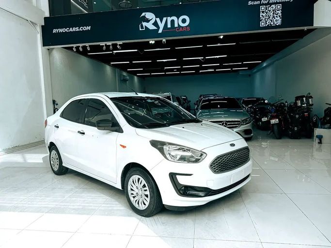 Подержанный Ford Figo II Рестайлинг, 1.5 л, 2019 в Шардже от Ryno Cars Белый цвет. GCC | AUTO.AE
