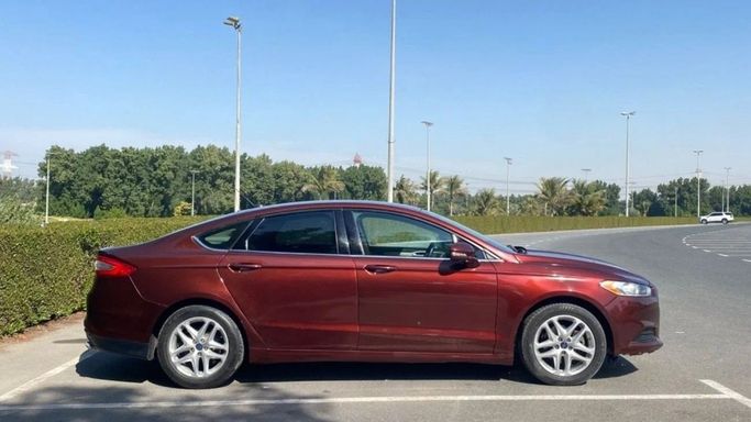 Подержанный Ford Fusion (North America) II, 2.0 л, 2016 в Шардже от Halla Cars Красный цвет. Американская | AUTO.AE