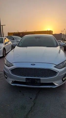 Used Ford Fusion (North America) II Facelift, 2.0 l, 2019 in UAE, Sharjah by Al Aqsa Used Cars, Silver color. American Specs | AUTO.AE | Listing #279077