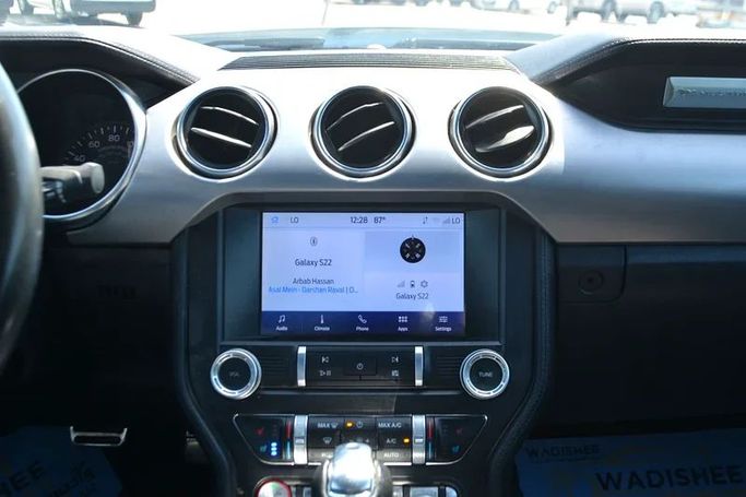 Used Ford Mustang VI Facelift, 2.3 l, 2023 in Sharjah by Wadishee Used Cars, White color. American Specs | AUTO.AE