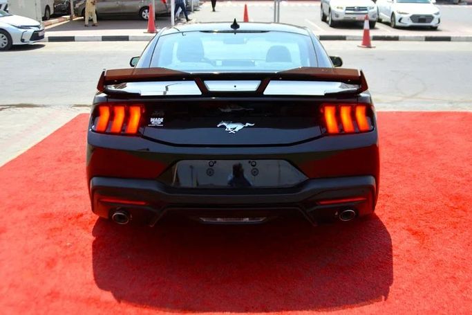 Used Ford Mustang VII, 2.3 l, 2024 in Sharjah by Wadishee Used Cars, Yellow color. American Specs | AUTO.AE