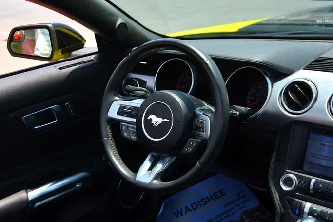 Used Ford Mustang VI Facelift, 2.3 l, 2019 in Sharjah by Wadishee Used Cars, Yellow color. American Specs | AUTO.AE