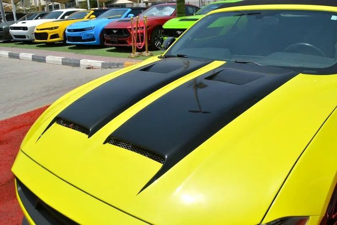 Used Ford Mustang VI Facelift, 2.3 l, 2019 in Sharjah by Wadishee Used Cars, Yellow color. American Specs | AUTO.AE