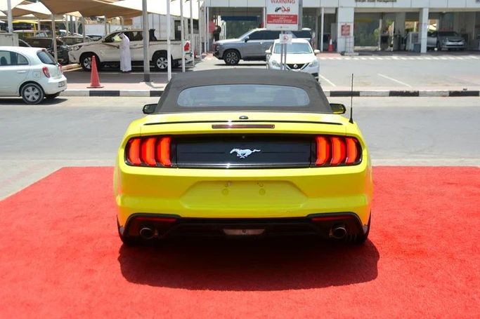 Used Ford Mustang VI Facelift, 2.3 l, 2019 in Sharjah by Wadishee Used Cars, Yellow color. American Specs | AUTO.AE
