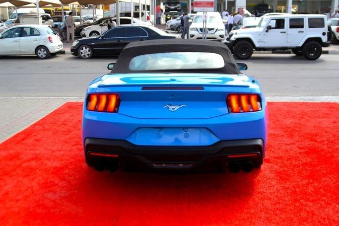 Used Ford Mustang VII, 2.3 l, 2024 in Sharjah by Wadishee Used Cars, Light Blue color. American Specs | AUTO.AE