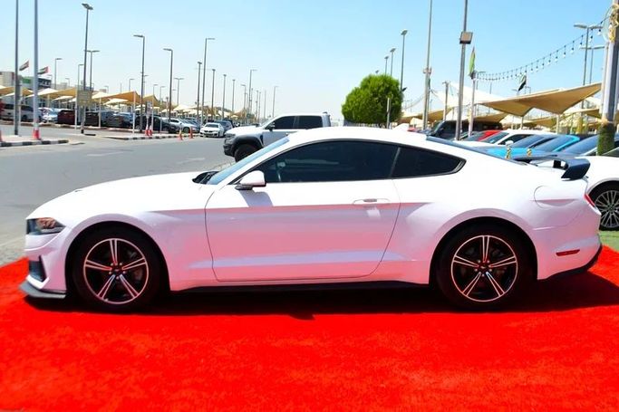 Used Ford Mustang VI Facelift, 2.3 l, 2023 in Sharjah by Wadishee Used Cars, White color. American Specs | AUTO.AE