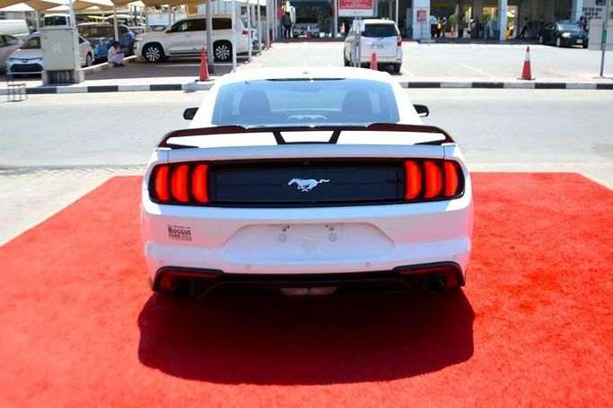Used Ford Mustang VI Facelift, 2.3 l, 2023 in Sharjah by Wadishee Used Cars, White color. American Specs | AUTO.AE