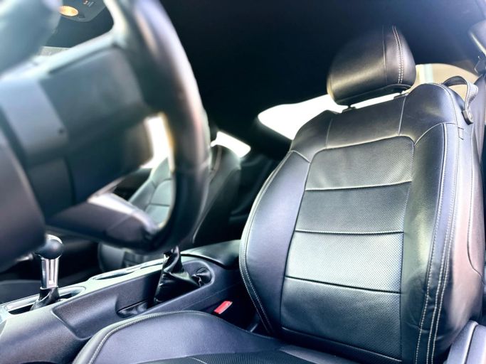 Подержанный Ford Mustang VI Рестайлинг, 2.3 л, 2022 в Шардже от Kandy Cars Белый цвет. Other | AUTO.AE