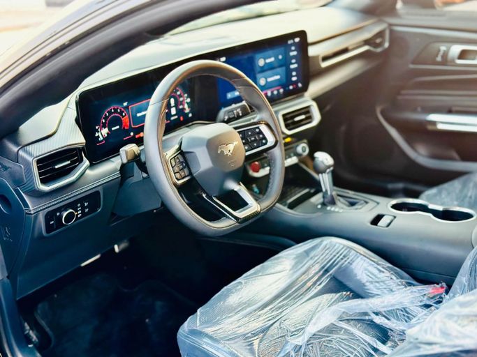 Used Ford Mustang VII, 2.3 l, 2024 in Sharjah by Kandy Cars, Black color. Other | AUTO.AE