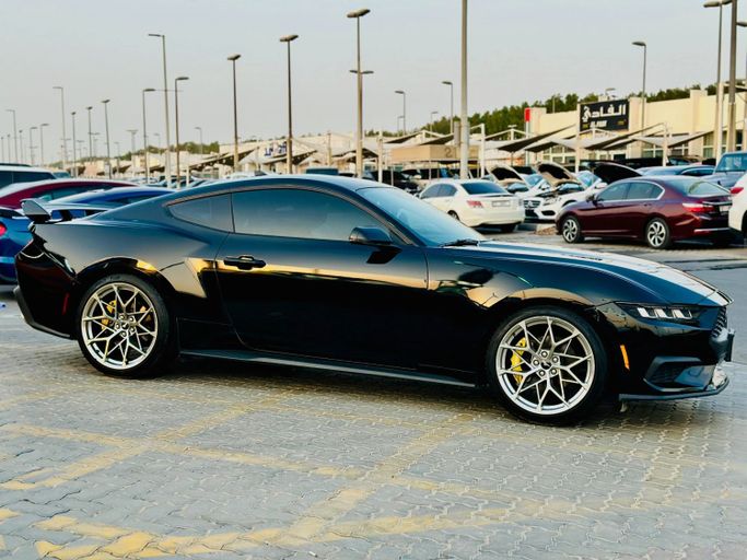 Used Ford Mustang VII, 2.3 l, 2024 in Sharjah by Kandy Cars, Black color. Other | AUTO.AE