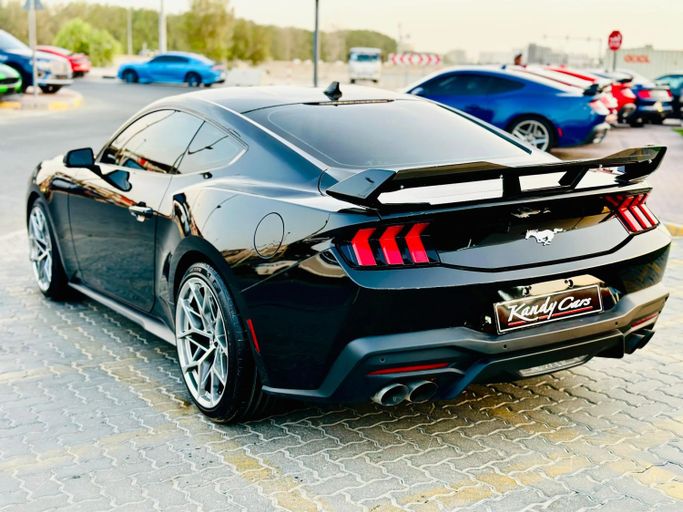 Used Ford Mustang VII, 2.3 l, 2024 in Sharjah by Kandy Cars, Black color. Other | AUTO.AE