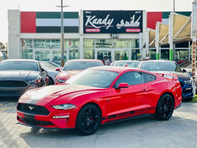 Подержанный Ford Mustang VI Рестайлинг, 2.3 л, 2021 в Шардже от Kandy Cars Красный цвет. Американская | AUTO.AE