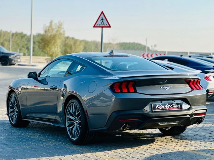 Подержанный Ford Mustang VII, 2.3 л, 2024 в Шардже от Kandy Cars Серый цвет. Американская | AUTO.AE