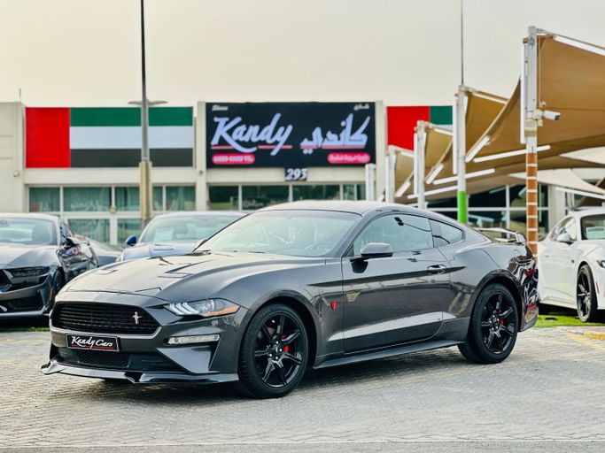 Подержанный Ford Mustang VI Рестайлинг, 2.3 л, 2019 в Шардже от Kandy Cars Серый цвет. Американская | AUTO.AE