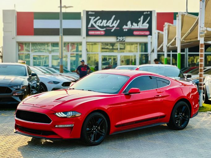 Подержанный Ford Mustang VI Рестайлинг, 2.3 л, 2021 в Шардже от Kandy Cars Красный цвет. Американская | AUTO.AE