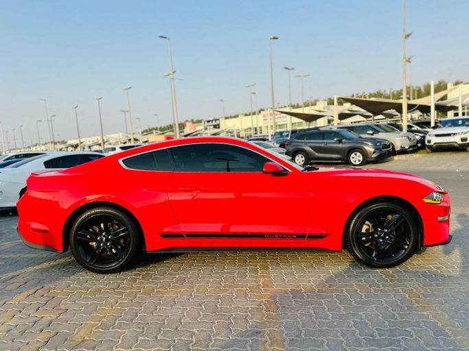 Подержанный Ford Mustang VI Рестайлинг, 2.3 л, 2021 в Шардже от Kandy Cars Красный цвет. Американская | AUTO.AE