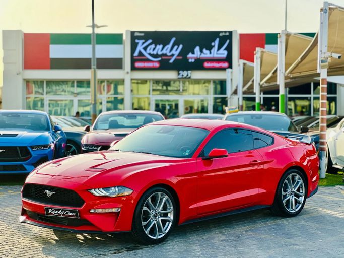 Подержанный Ford Mustang VI Рестайлинг, 2.3 л, 2019 в Шардже от Kandy Cars Красный цвет. Американская | AUTO.AE