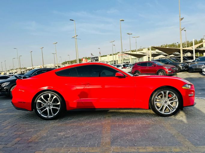 Подержанный Ford Mustang VI Рестайлинг, 2.3 л, 2019 в Шардже от Kandy Cars Красный цвет. Американская | AUTO.AE