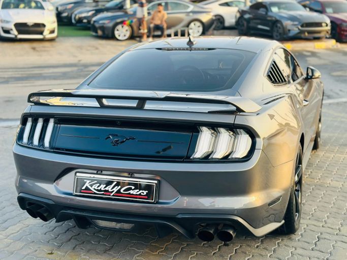 Подержанный Ford Mustang VII, 2.3 л, 2023 в Шардже от Kandy Cars Серый цвет. Американская | AUTO.AE