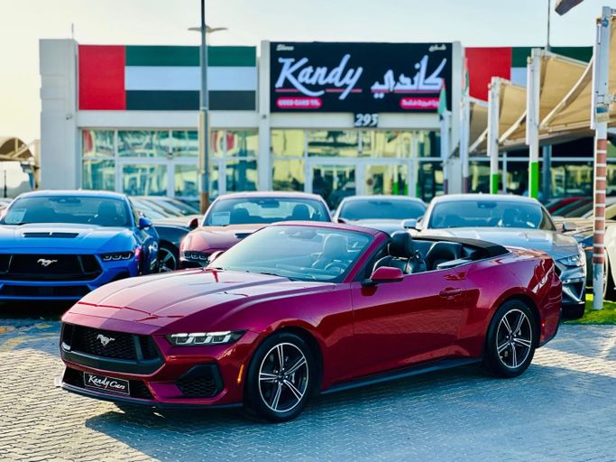 Подержанный Ford Mustang VII, 2.3 л, 2024 в Шардже от Kandy Cars Бордовый цвет. Канадская | AUTO.AE