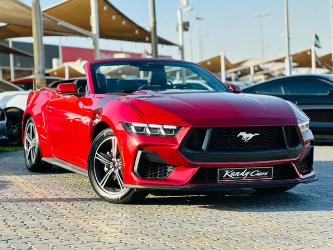 Подержанный Ford Mustang VII, 2.3 л, 2024 в Шардже от Kandy Cars Бордовый цвет. Канадская | AUTO.AE