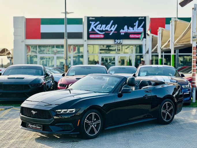 Подержанный Ford Mustang VII, 2.3 л, 2024 в Шардже от Kandy Cars Черный цвет. Американская | AUTO.AE