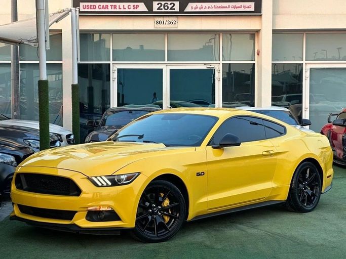 Used Ford Mustang VI, 5.0 l, 2015 in Sharjah by Noor Al Seyoh Used Cars, Yellow color. GCC Specs | AUTO.AE