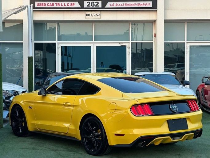 Used Ford Mustang VI, 5.0 l, 2015 in Sharjah by Noor Al Seyoh Used Cars, Yellow color. GCC Specs | AUTO.AE
