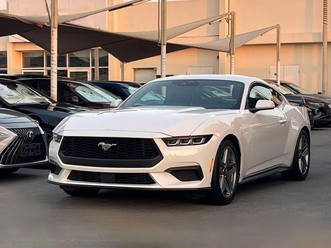 Used Ford Mustang VII, 2.3 l, 2024 in Sharjah by Al Nukhba Al Malakyah Used Cars, White color. American Specs | AUTO.AE