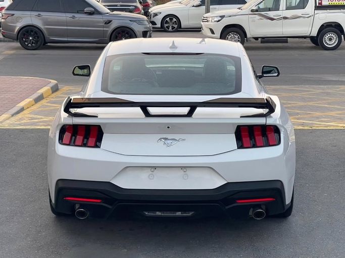 Used Ford Mustang VII, 2.3 l, 2024 in Sharjah by Al Nukhba Al Malakyah Used Cars, White color. American Specs | AUTO.AE