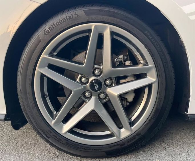 Used Ford Mustang VII, 2.3 l, 2024 in Sharjah by Al Nukhba Al Malakyah Used Cars, White color. American Specs | AUTO.AE