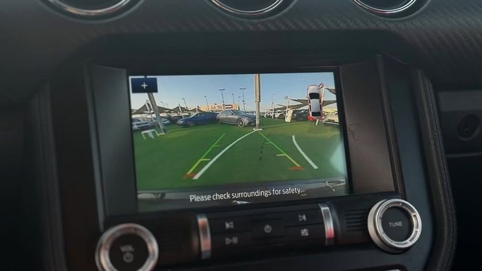 Подержанный Ford Mustang VI Рестайлинг, 2.3 л, 2021 в Шардже от Badar Used Cars Черный цвет.  | AUTO.AE