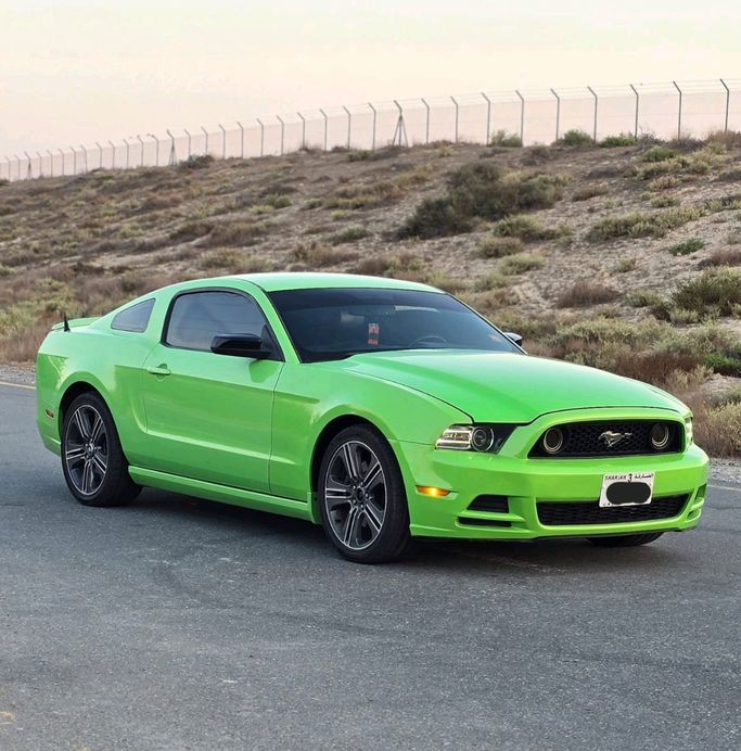 Used Ford Mustang V Facelift, 4.6 l, 2014 in Sharjah by Al Sayarah Al Oula, Green color. American Specs | AUTO.AE
