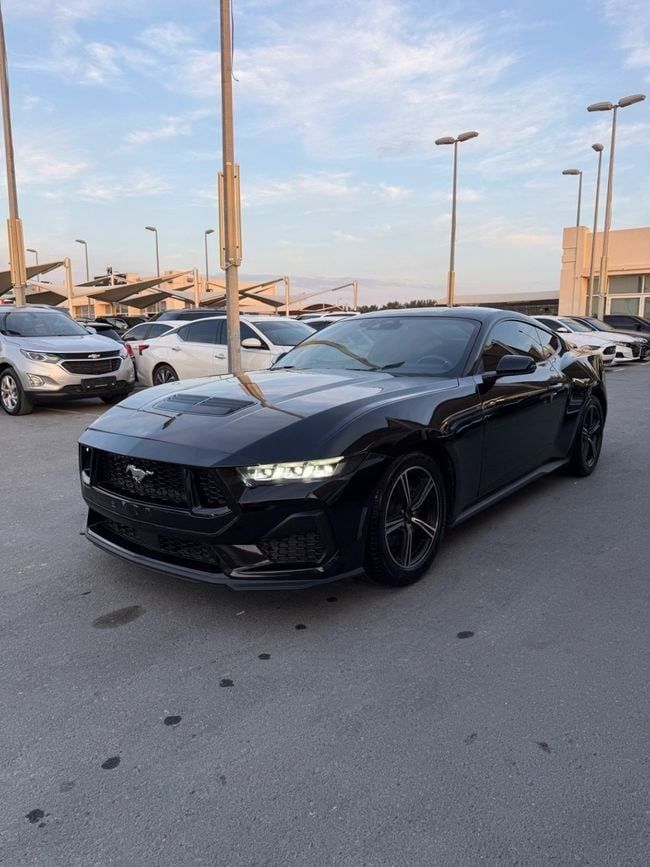 Used Ford Mustang VII, 2.3 l, 2024 in Sharjah by Emirates & Gulf used cars, Black color. GCC Specs | AUTO.AE
