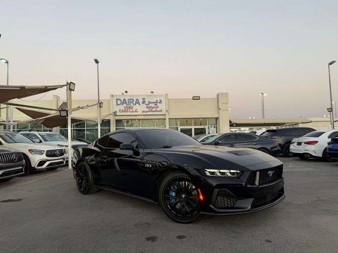 Подержанный Ford Mustang GT VII, 5.0 л, 2024 в Шардже от Daira Used Cars Черный цвет. Американская | AUTO.AE | Объявление #254481